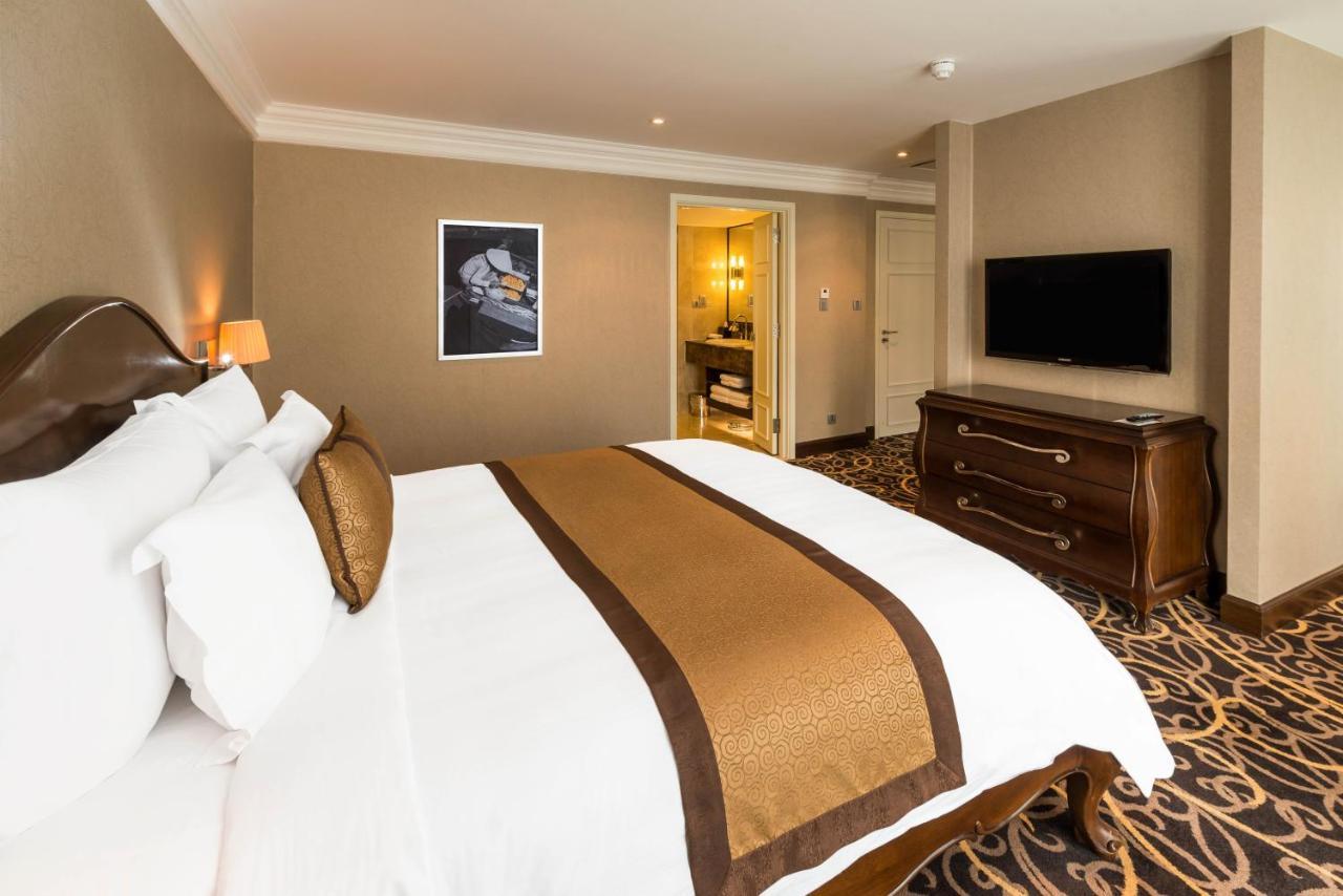 הו צ'י מין סיטי Eastin Grand Hotel Saigon מראה חיצוני תמונה A bedroom at the hotel