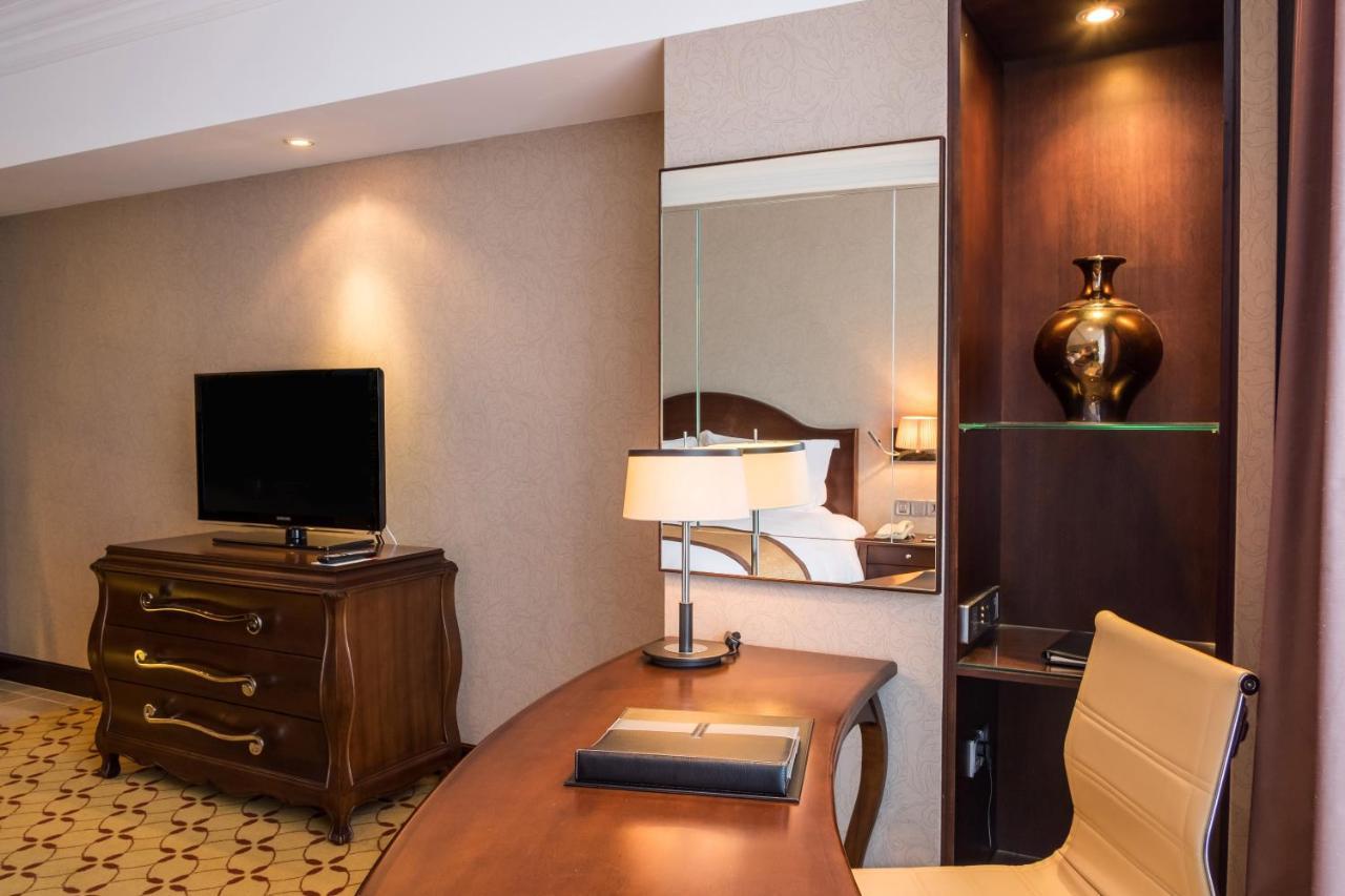 הו צ'י מין סיטי Eastin Grand Hotel Saigon מראה חיצוני תמונה A room at the hotel