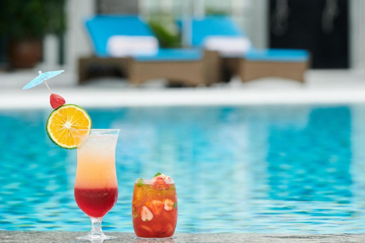 הו צ'י מין סיטי Eastin Grand Hotel Saigon מראה חיצוני תמונה Poolside drinks