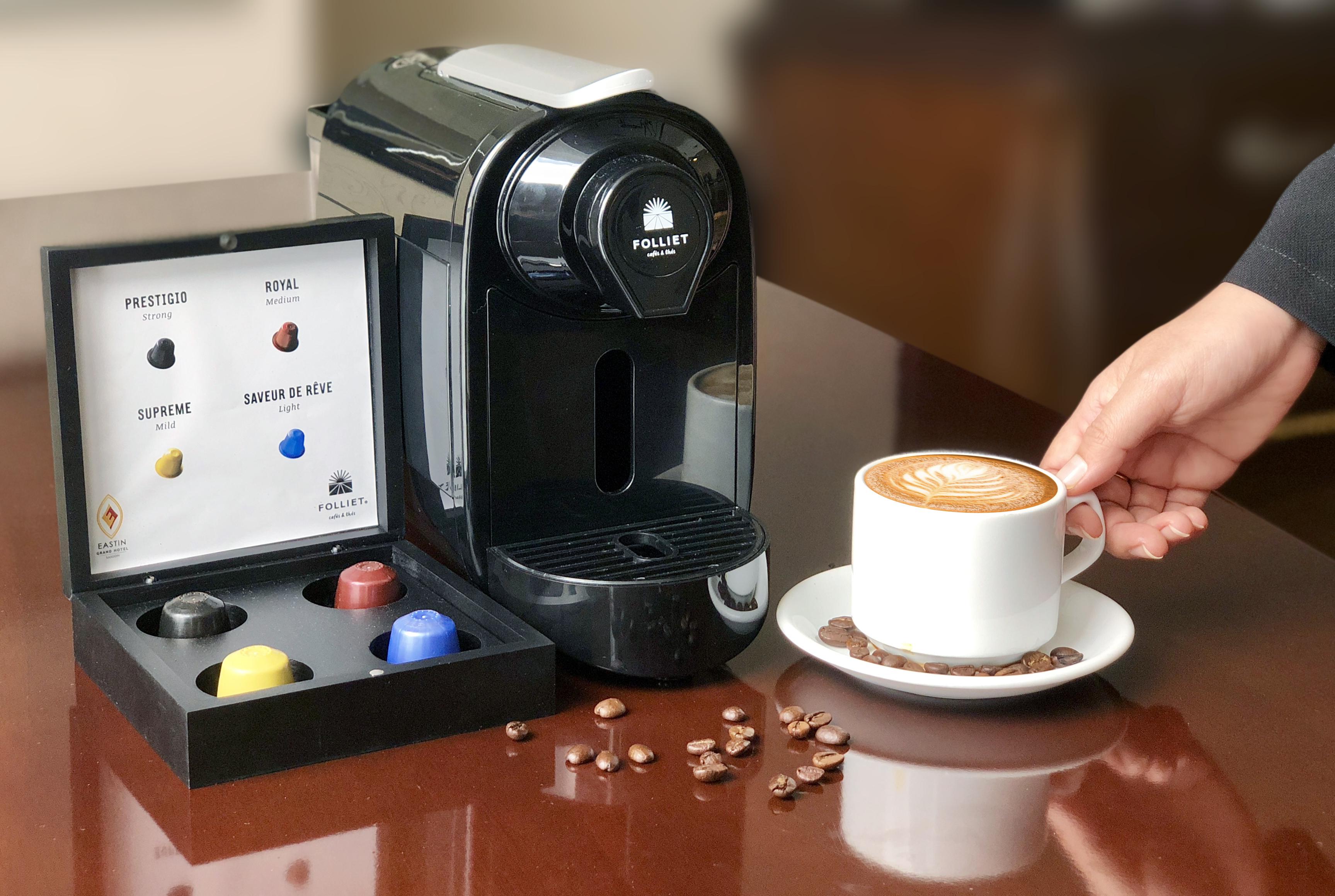 הו צ'י מין סיטי Eastin Grand Hotel Saigon מראה חיצוני תמונה A single serve coffee machine