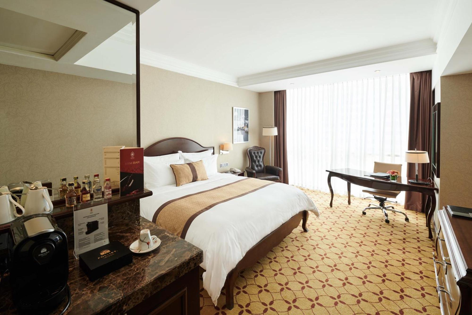 הו צ'י מין סיטי Eastin Grand Hotel Saigon מראה חיצוני תמונה Deluxe Room